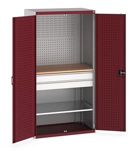 40021162.** Bott cubio kitted cupboard with lockable steel perfo lined doors 1050mm wide x 650mm deep x 2000mm high.  Supplied with Perfo/Louvre back panels, 1 x wooden worktop, 1 x metal shelf and 2 drawers.   Shelf capacity 100kgs. Drawer Capacity 75kgs. ...